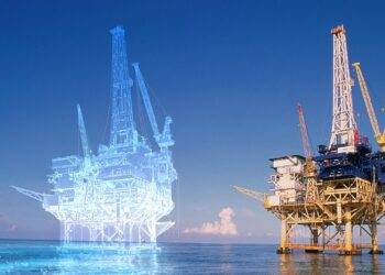 Plataforma industrial no mar ao lado de uma versão translúcida que representa seu gêmeo digital