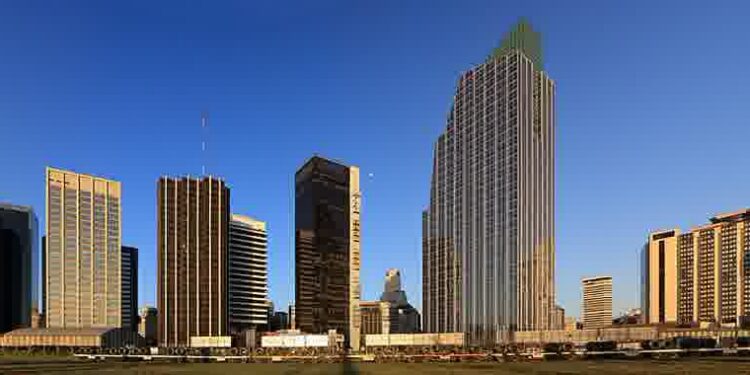 Argentina pode ser primeiro país a criar categoria legal para empresas operadas por IA 28 Skyline de Buenos Aires ao entardecer, com prédios empresariais ao fundo e grama em primeiro plano